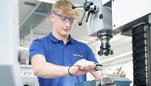 An apprentice in the Industrial Metalworking sector at work